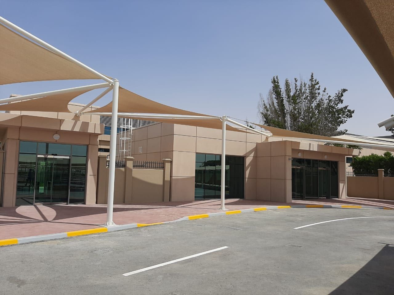 Reception building, shade structures and approach road delivered by AIMS as main contractor at Zayed University
